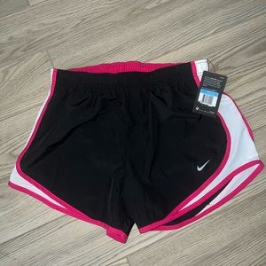 Brand New woman’s sport shorts!!!  Nike  brand size Medium smoke free home 🚭